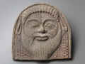 Cleveland, Museum of Art. Antefissa con volto di Sileno, da Taranto. Seconda metà del V secolo a.C., altezza cm 25.
